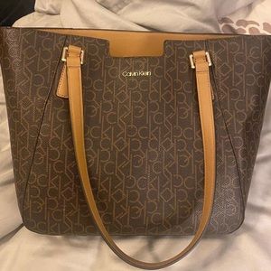 Calvin Klein purse. I’m brand new condition, barely used.